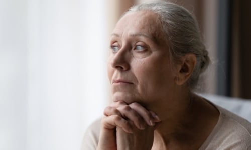 woman in her 60s looking in the distance
